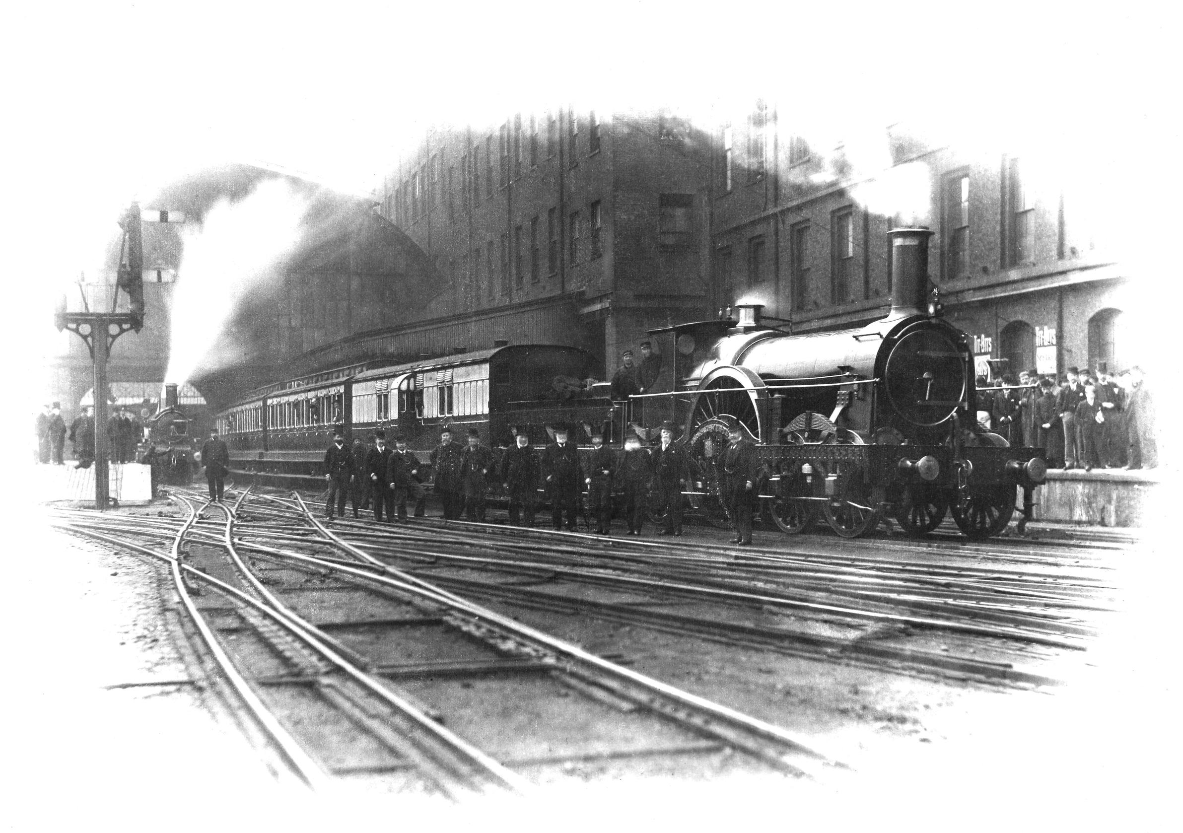 Railway staff line up for a portrait at Paddington station in the 1890s