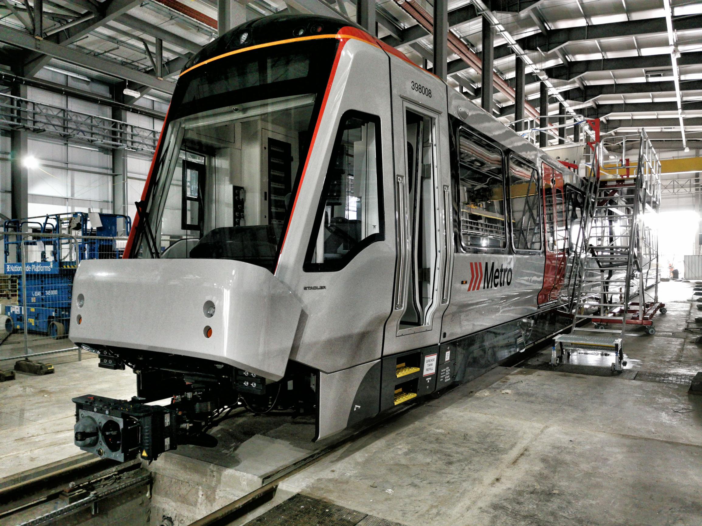 The first tram-train for the South Wales Metro inside the new depot at Taff`s Well
