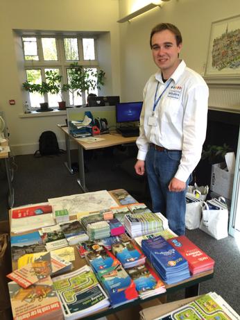 A member of the Connecting Wiltshire team with assorted publicity materials