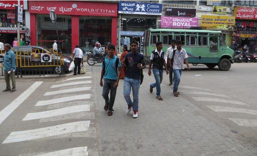 These two photos are from this publication and are recommendations for Indian cities. Both show the possibilities around giving pedestrians more space
