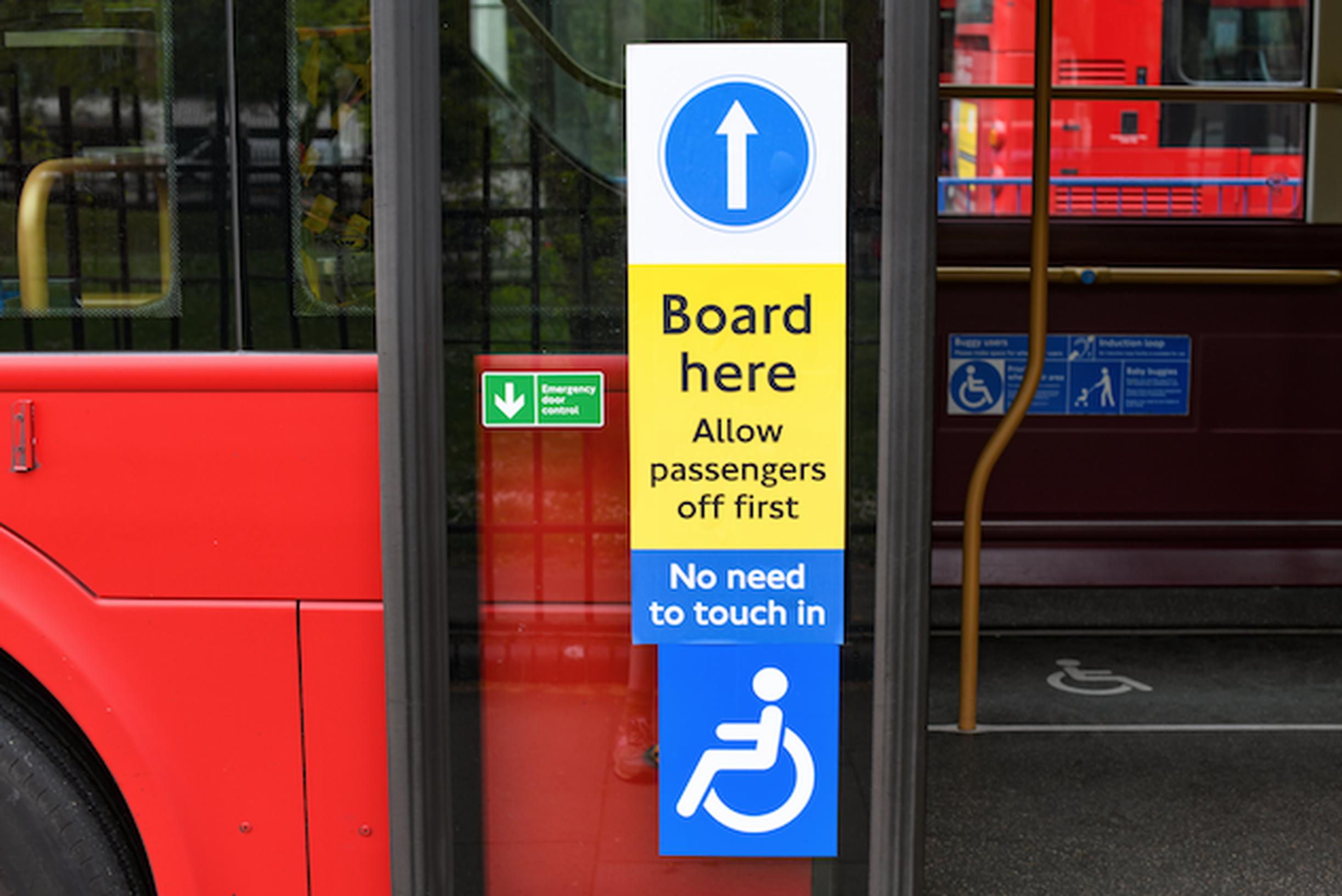 Instruction signs have been applied to London buses