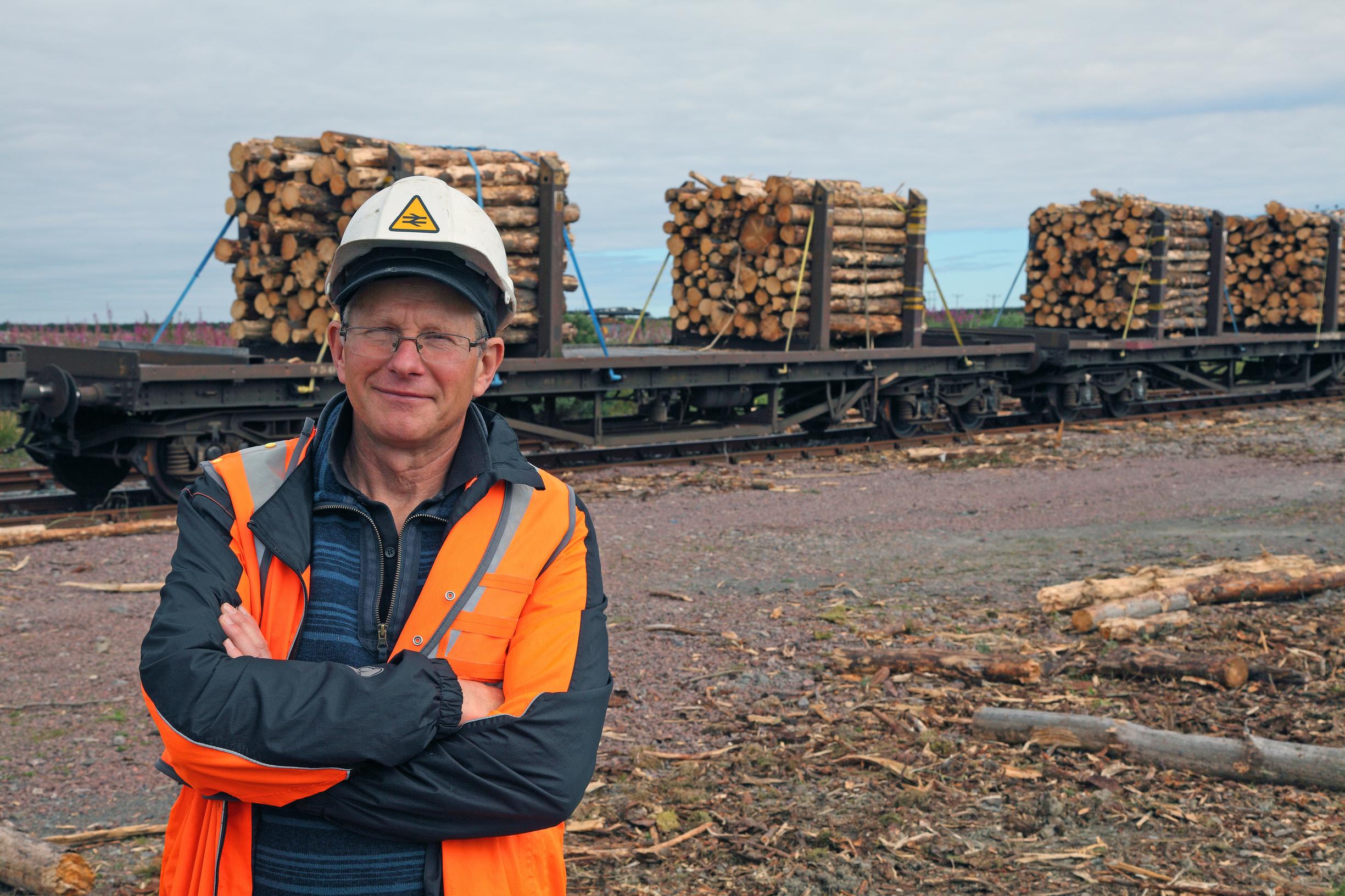 Hitrans partnership manager Frank Roach at Georgemas, and a loaded train heading to Inverness