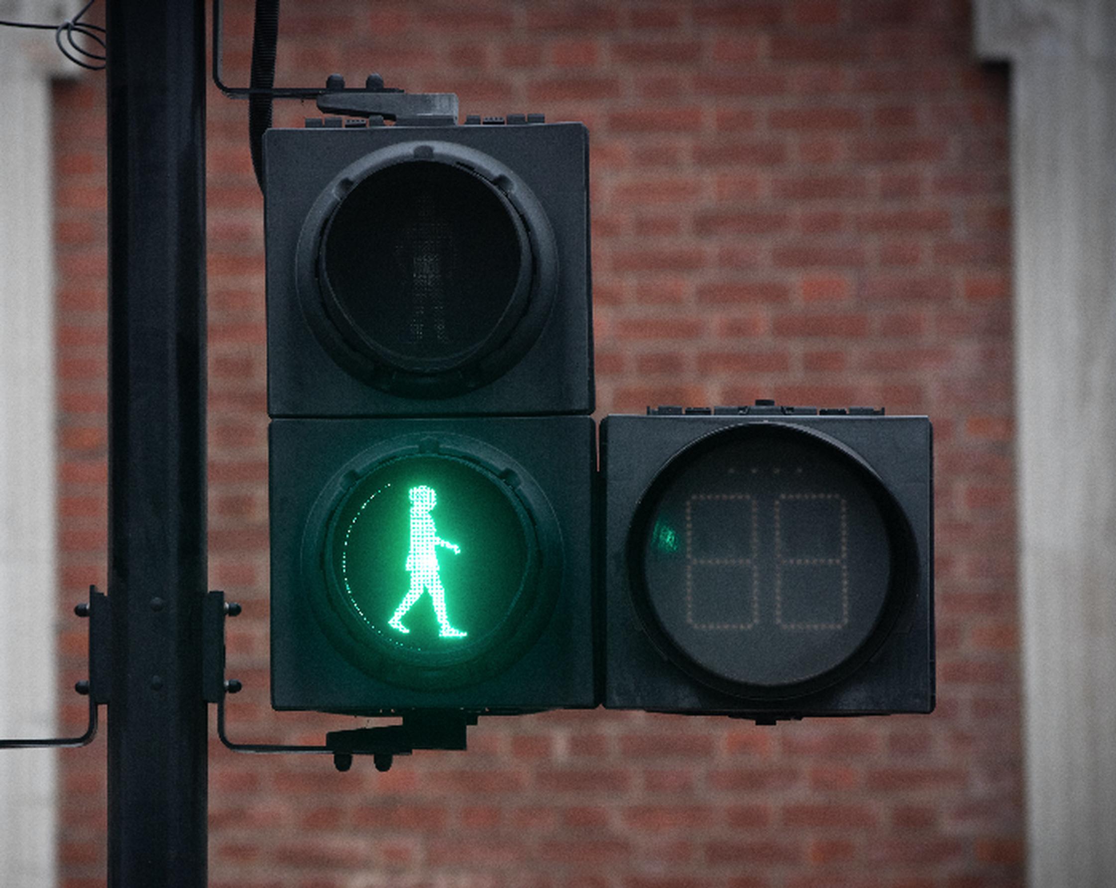 A new green woman traffic light in London