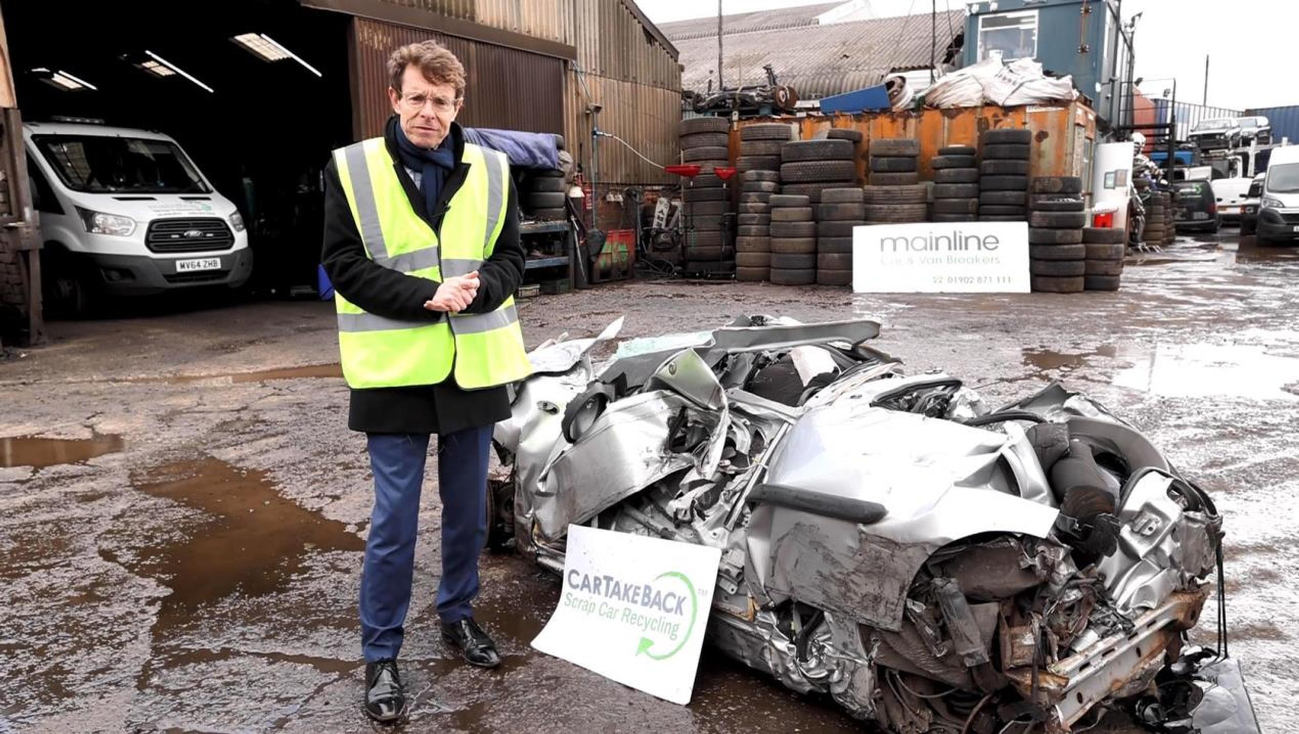 West Midlands mayor Andy Street with the first car to be scrapped