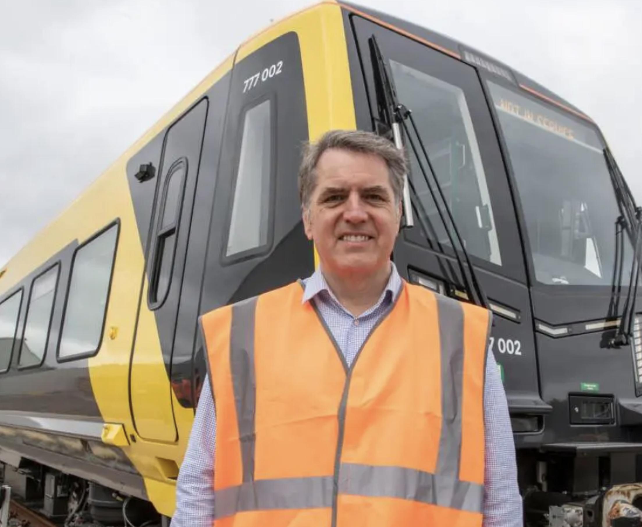 Metro mayor Steve Rotheram and the battery-powered Class 777