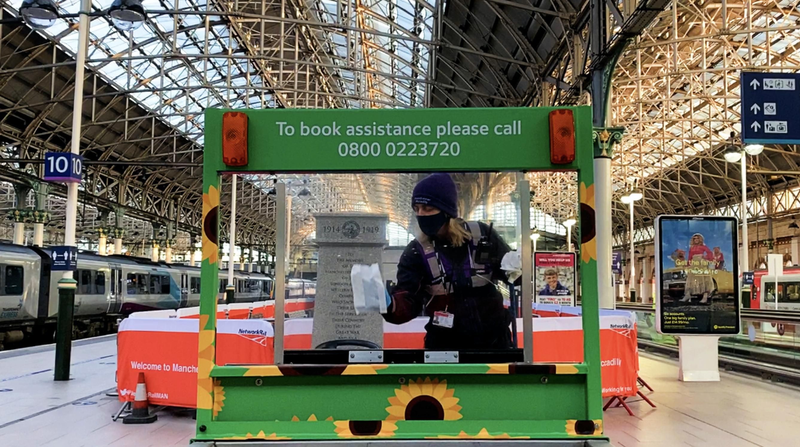 Cleaning an assistance station at Manchester Piccadilly