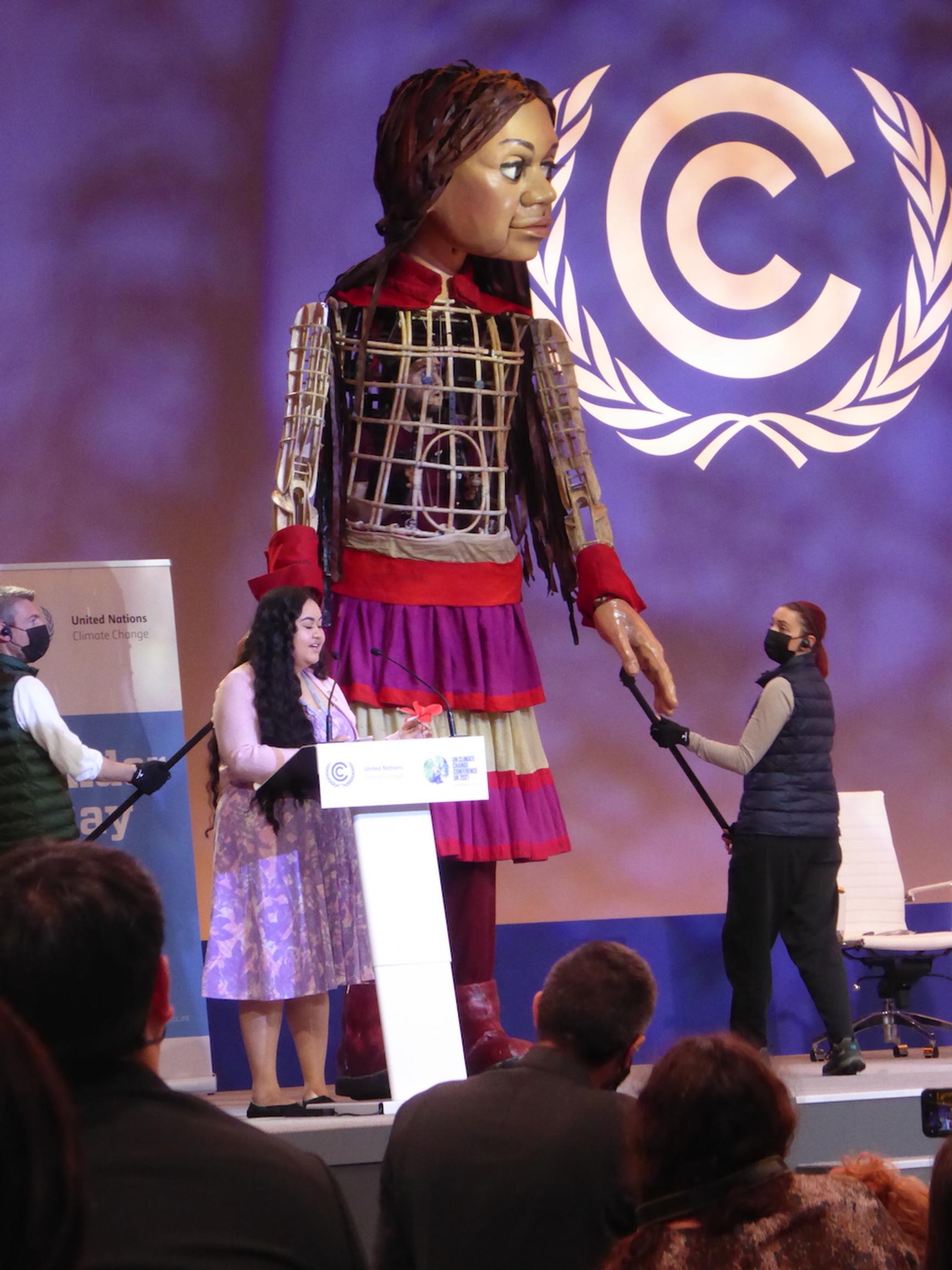 Little Amal, a 3.5m puppet of a ten-year-old Syrian refugee, takes centre stage at COP26 on `Gender Day`
