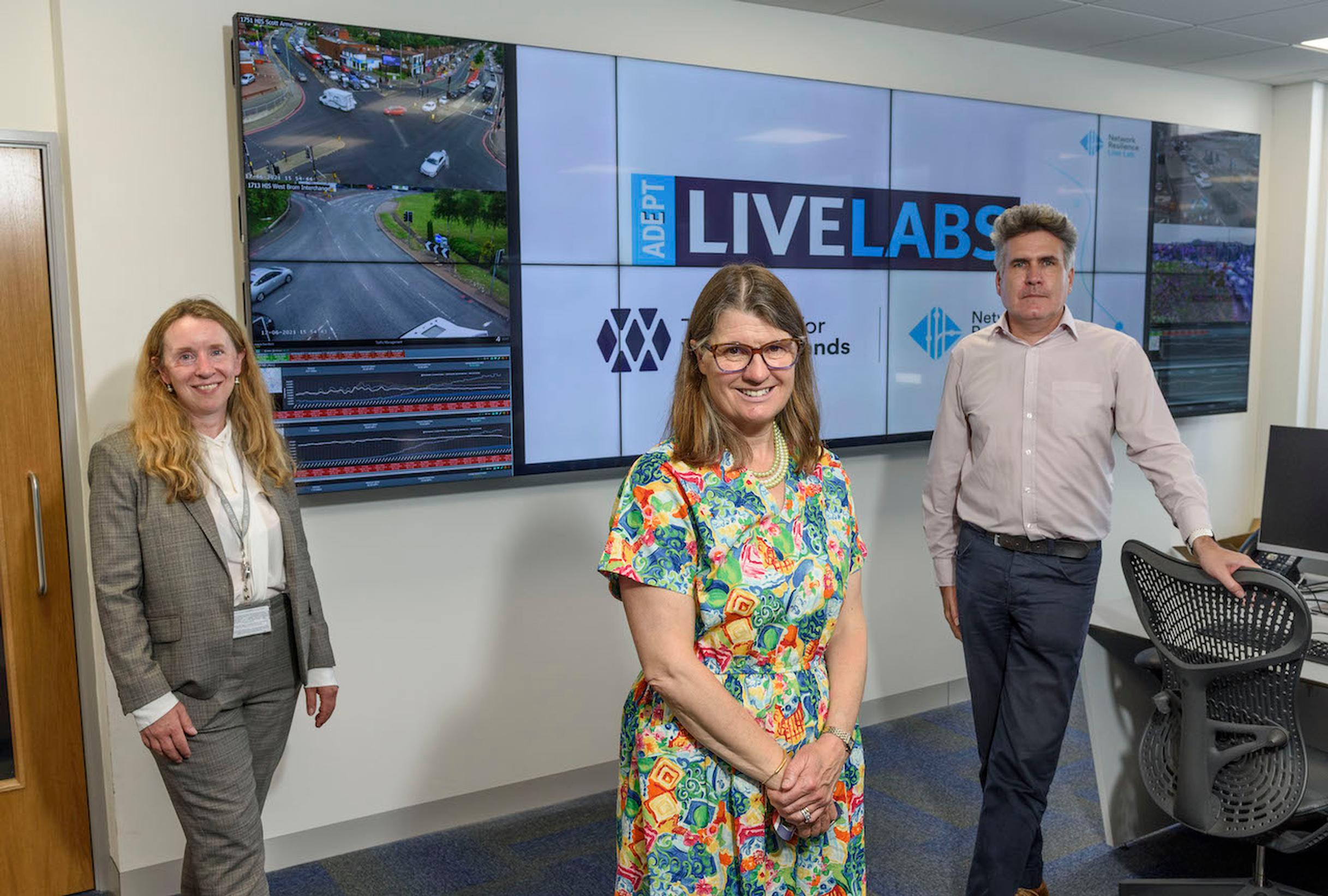 Rachel Maclean MP [centre] visits the NR Live Lab. Deborah Fox, TfWM Head of Demand Management [left]. Giles Perkins, WSP Head of Future Mobility [right].