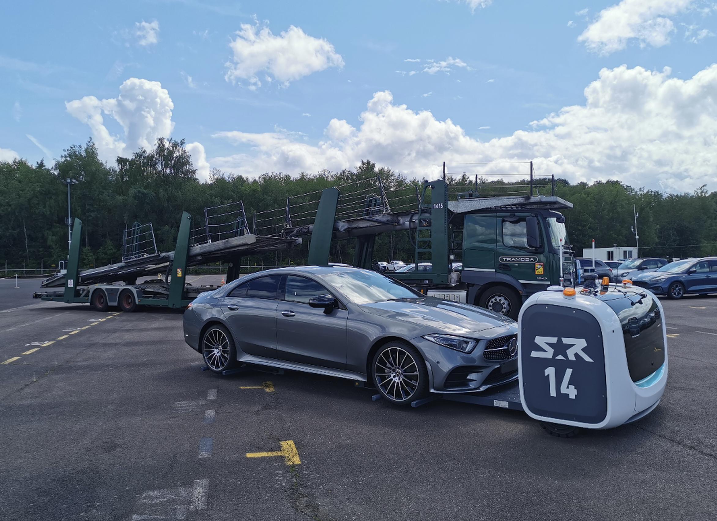 A Stan robot collecting a car