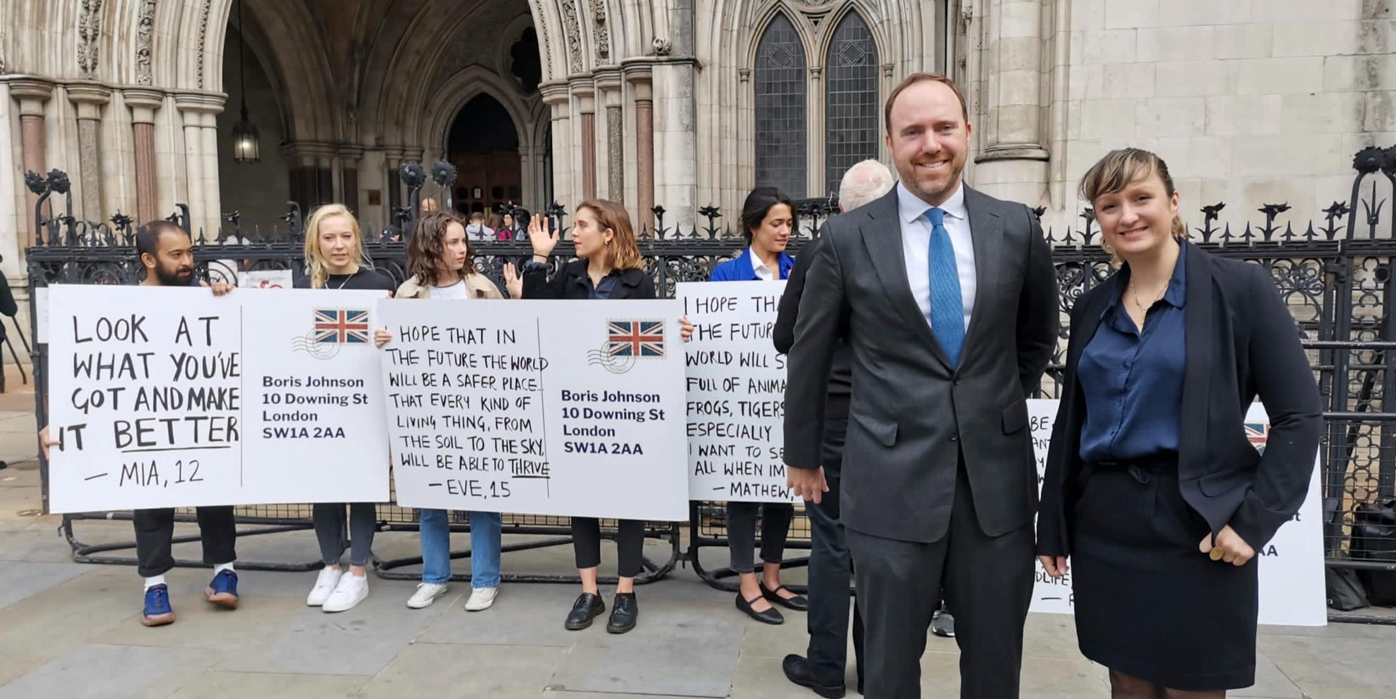 ClientEarth lawyers Sam Hunter-Jones and Sophie Marjanac outside the High Court on the first day of the hearing