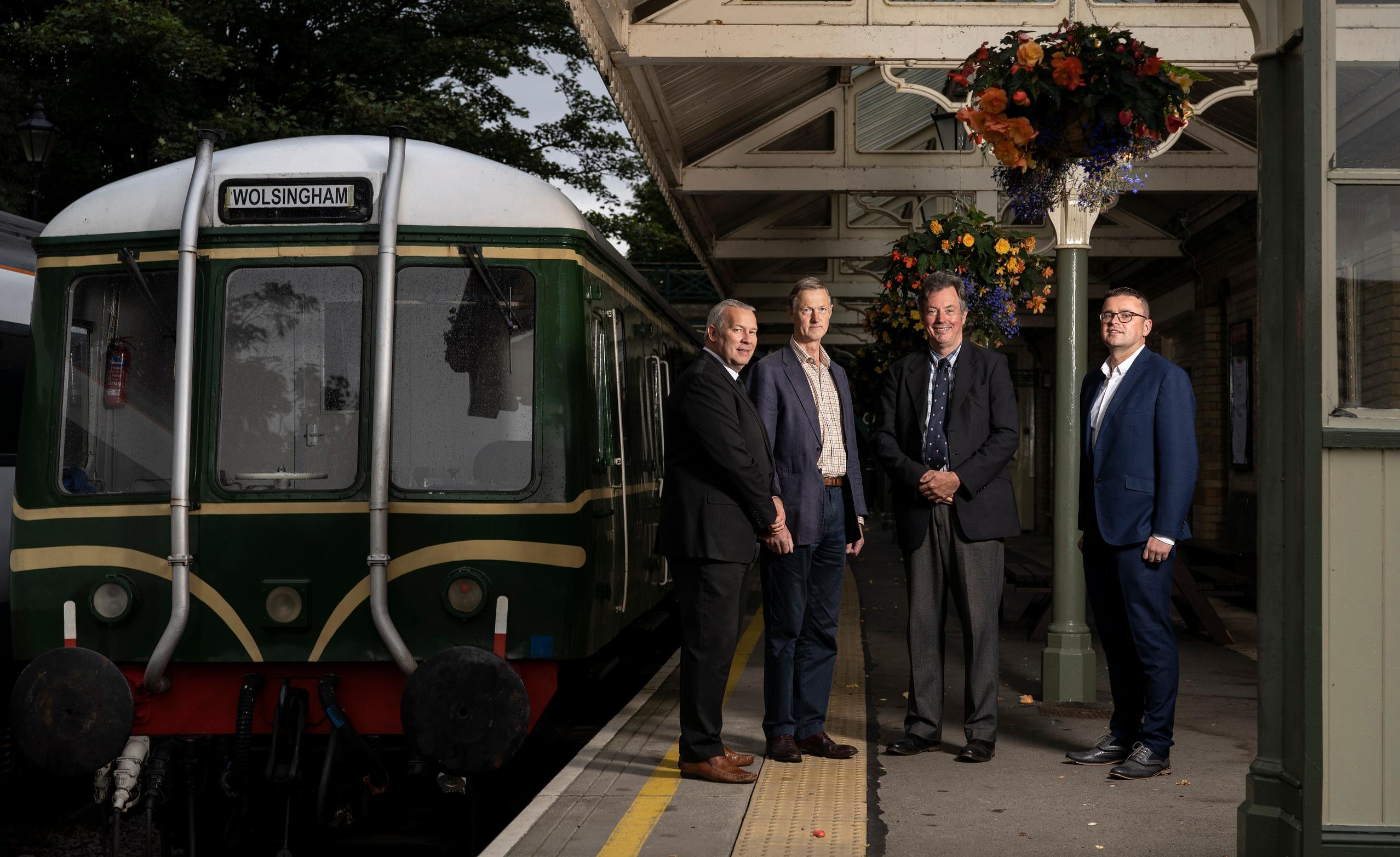 The Strategic Outline Business Case team at Stanhope station on the proposed Darlington to Weardale line. The train belongs to the Weardale Railway Trust, run by volunteers