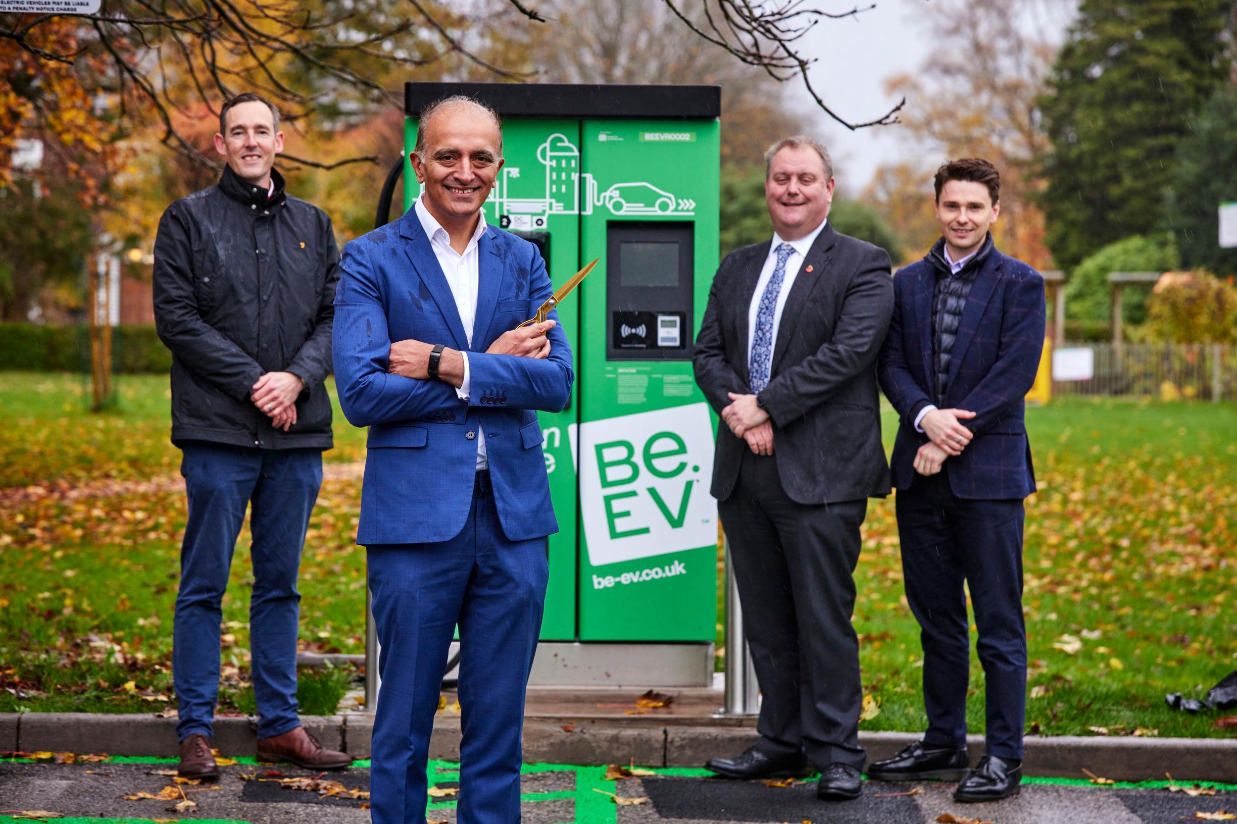 Mark Constantine (Be.EV network manager), Asif Ghafoor (Be.EV CEO), Chris Morris (Trafford Council director of transport, highways and environment) and John MacBrayne (Be.EV Business Solutions) open the new chargers at Thorley Road car park, Urmston