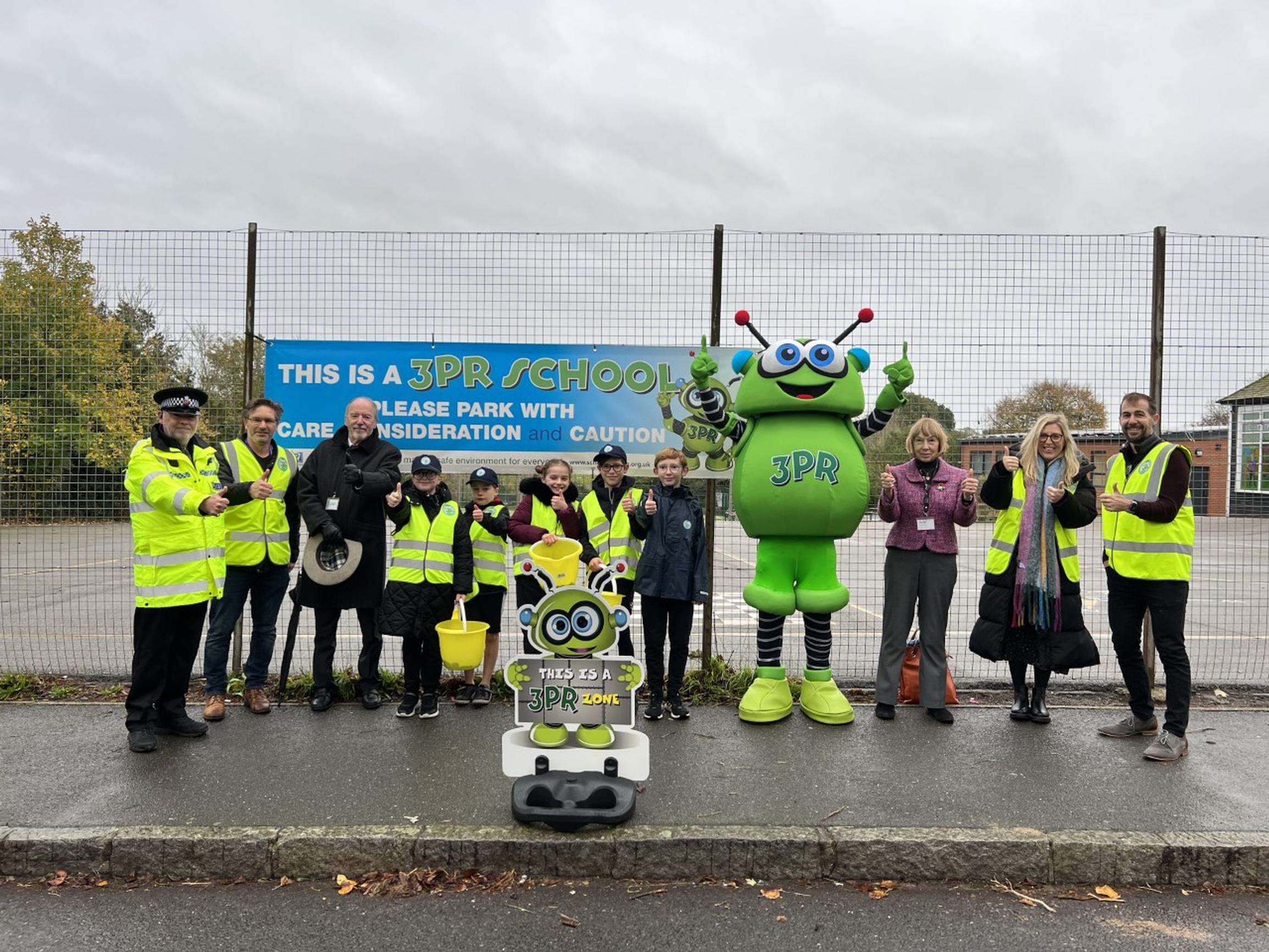 Earls Colne Primary School 3PR launch: Cllr Richard Van Dulken (NEPP’s Member for Braintree District Council), Cllr Gabriella Spray (Braintree District Council Ward Councillor), Ms Sibley, Headteacher of Earls Colne Primary School, school staff and pupils, Essex Police. and 3PR costumed character