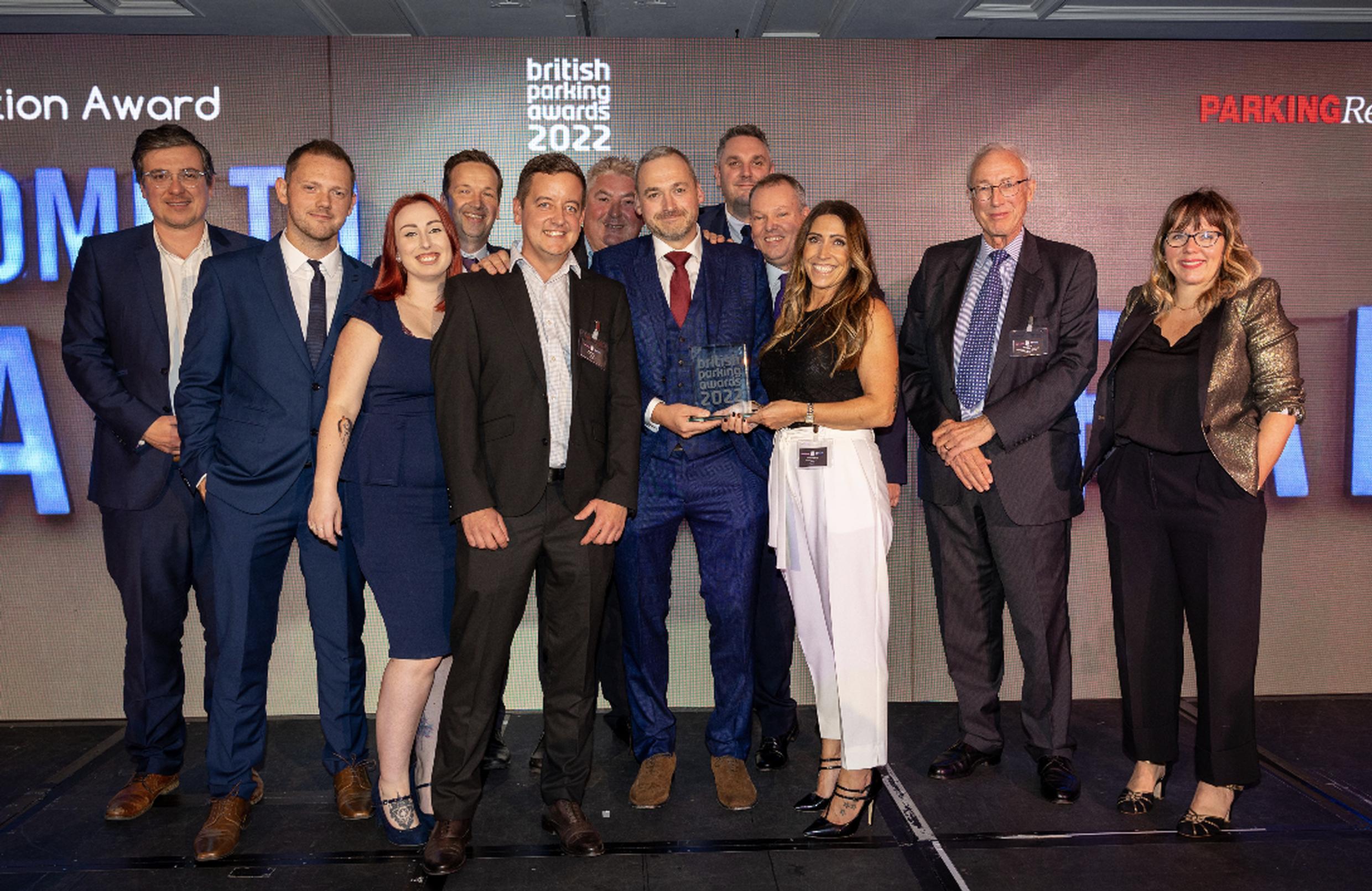 Nic Collins, Callum Marks, Grace Roden, David Hockley, Phil Hosier, Kenny Dittman, Mike Wood, Tom Revett, Mike Elrin and Jo Burton received their award from jury member John Elliott and Kerry Godliman
