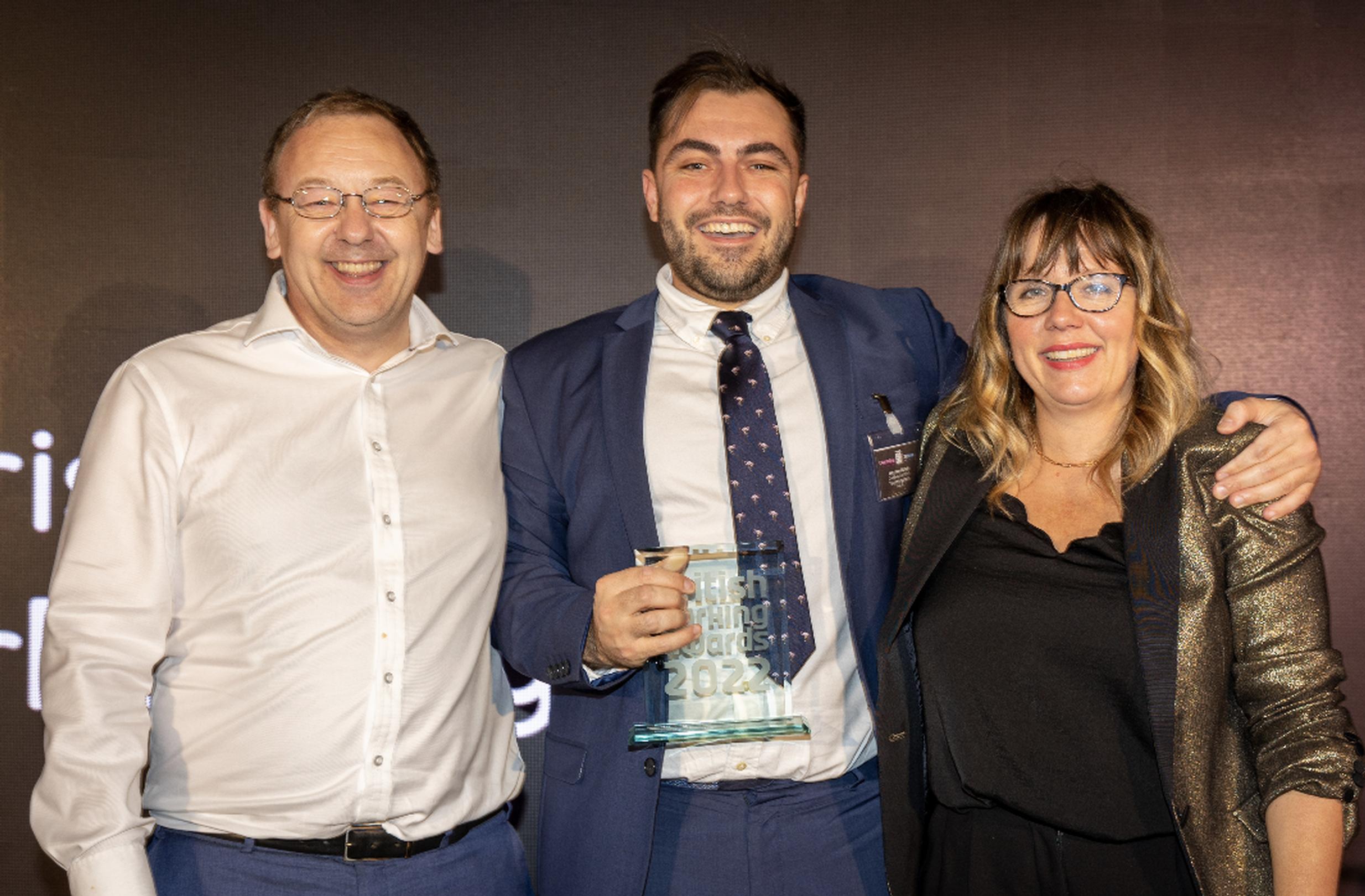 Chipside’s Paul Moorby OBE and awards host Kerry Godliman with Harrison Woods