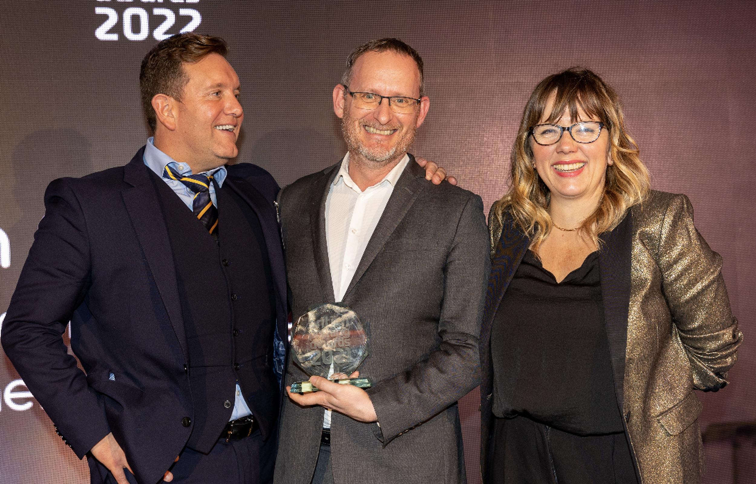 John Galsworthy with Stewart Clure of category sponsor DRPL and awards host Kerry Godliman