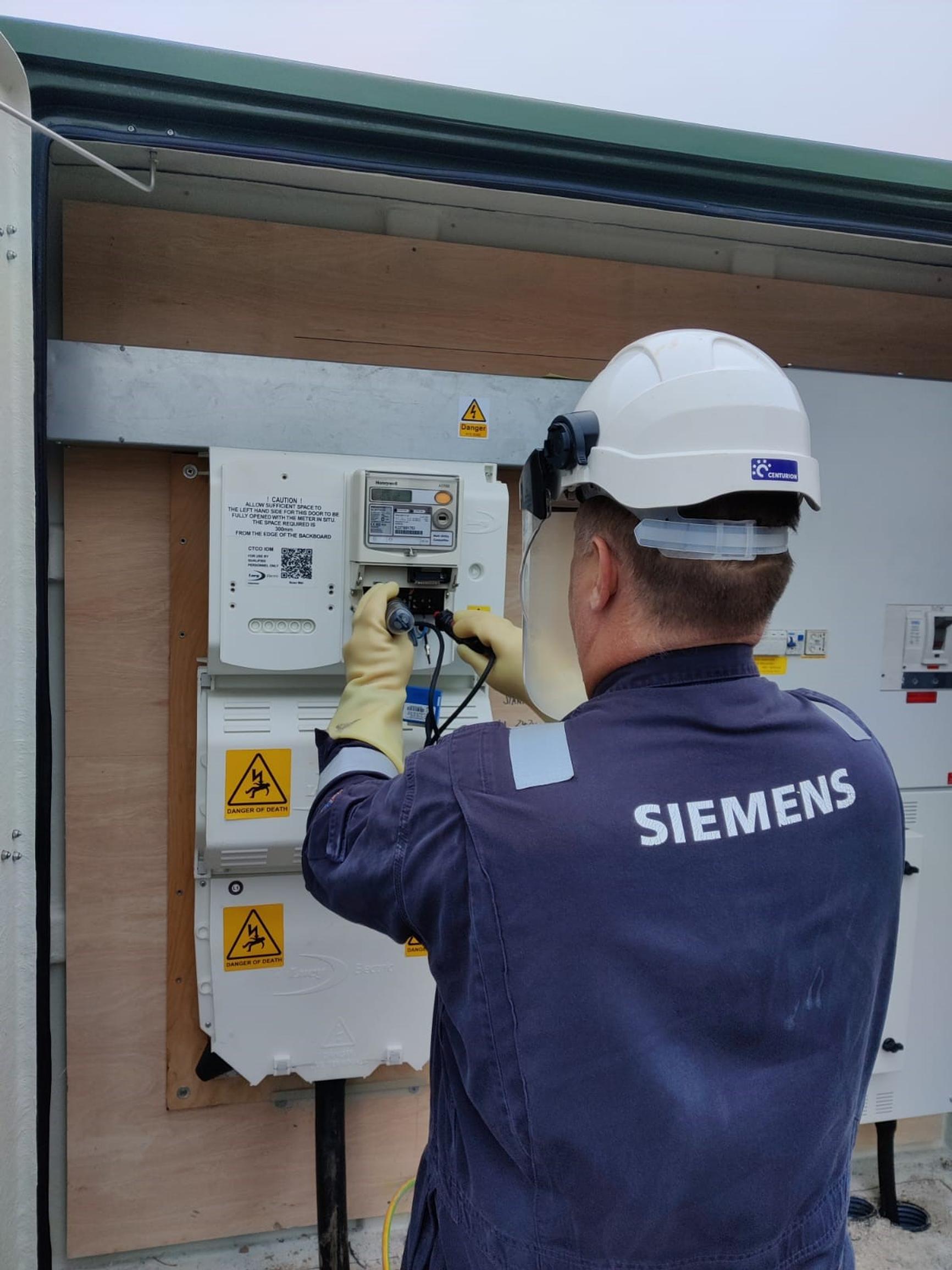 A Siemens Smart Infrastructure engineer at work
