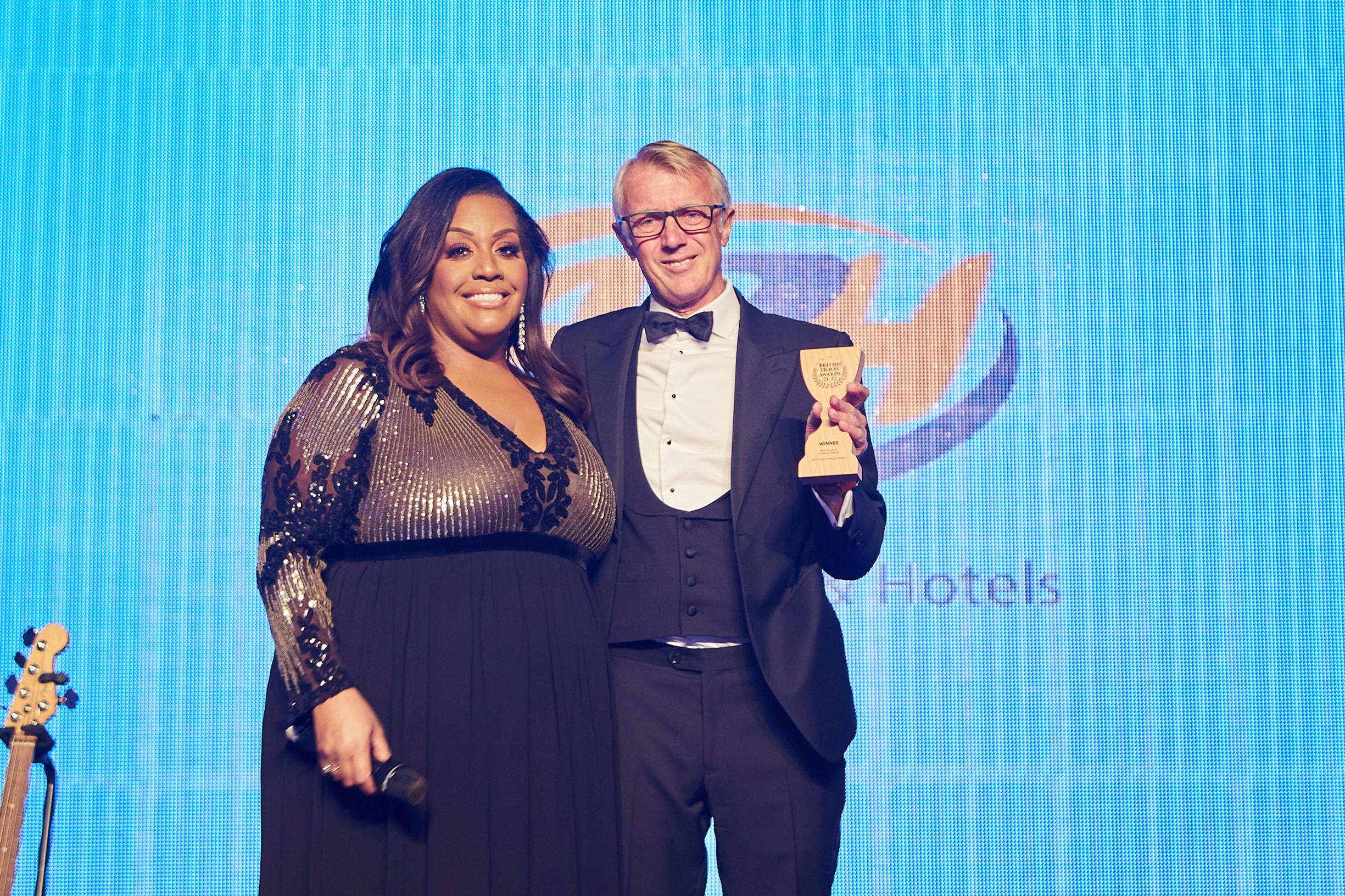 Alison Hammond presents APH’s Nick Caunter with the award for Best Company for Airport Parking