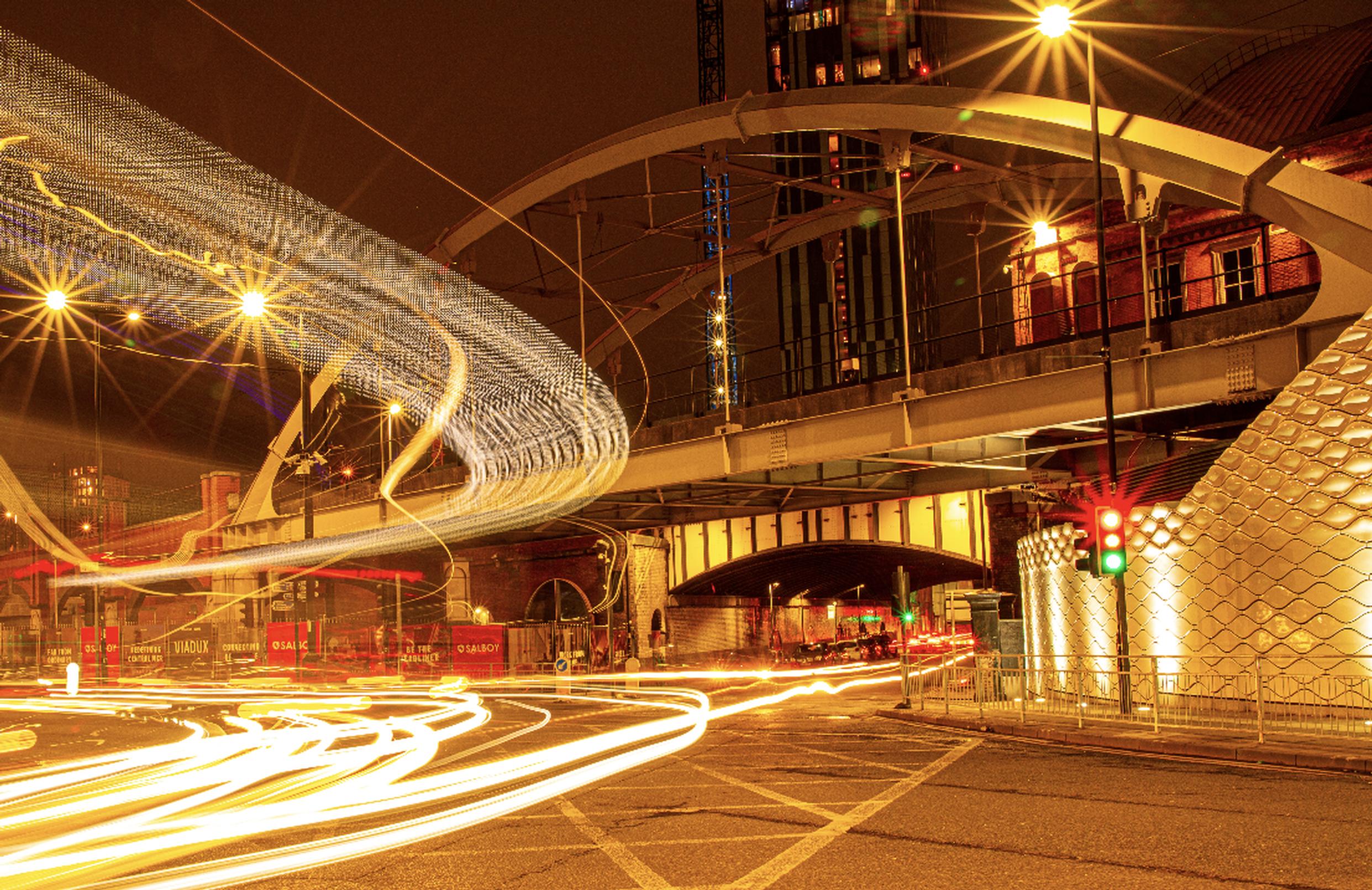 Feeling a bit nostalgic, like his parents before him Jordan took the wheel and guided the vehicle off the drive and onto the smaller roads that would lead them to the motorway (Image: Manchester 2022 by David Peach)