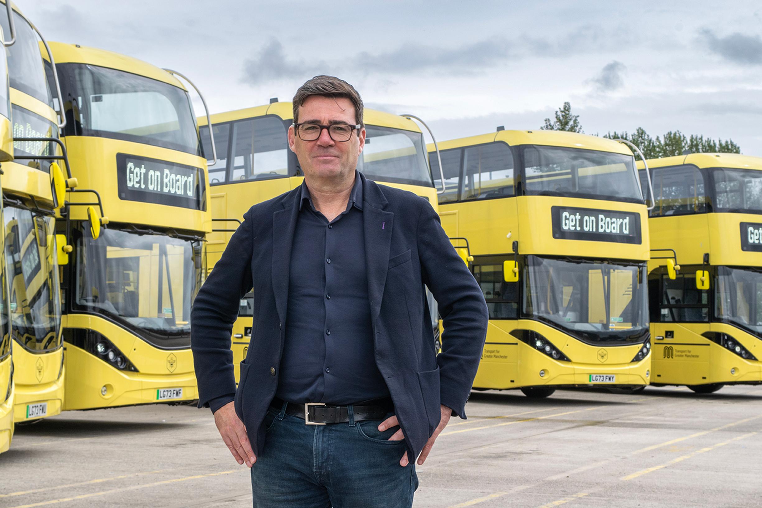Greater London Mayor Andy Burnham with the fleet of new electric buses