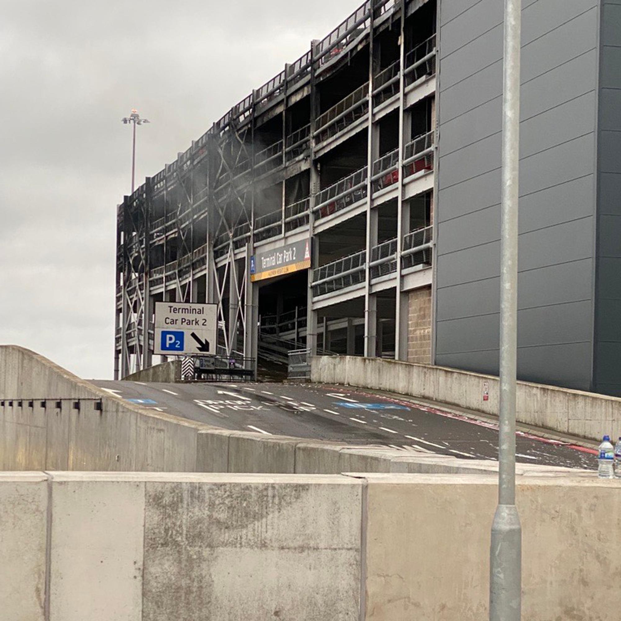 Man arrested over Luton Airport car park fire