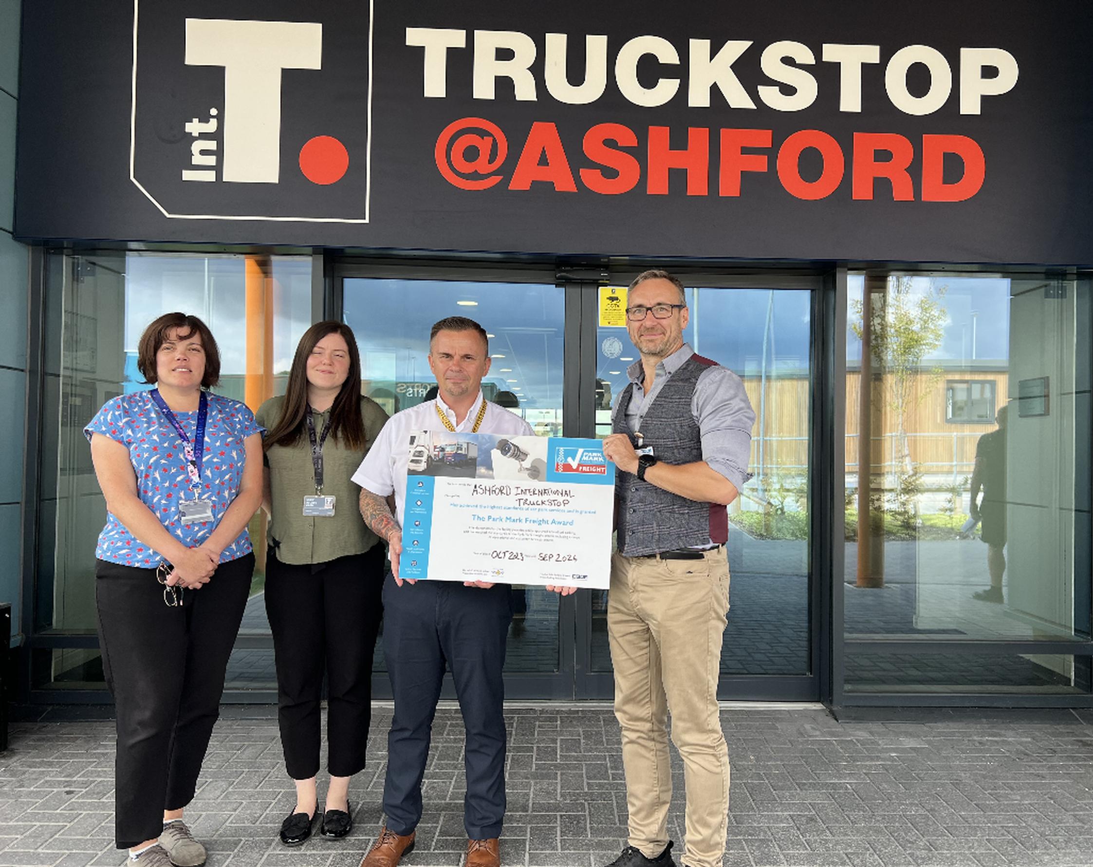 Ian Wilson, BPA Area Manager for the South East, presents the Park Mark Freight award to the AIT team
