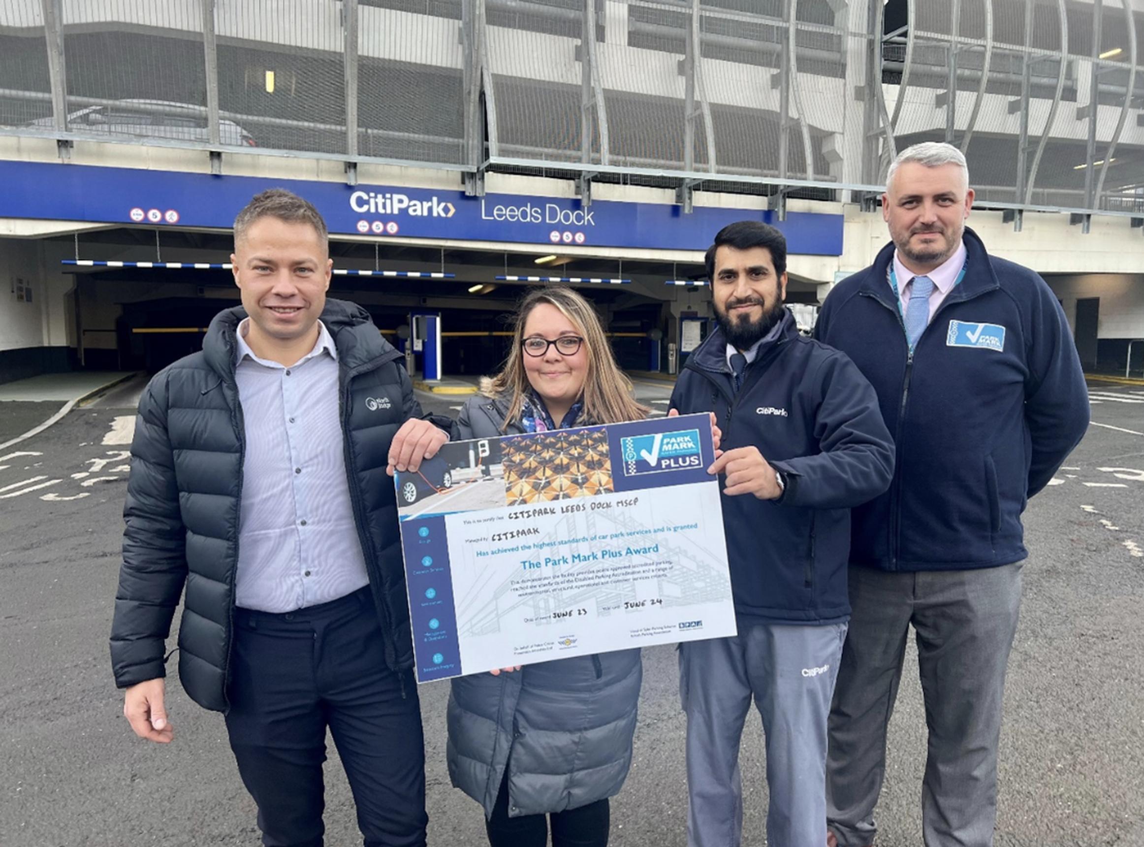 (L-R) Pawel Leputa, Leeds area manager, Victoria Cayzer, head of car park management and Mohammed Khan, Leeds Dock supervisor, with Ryan Davey, BPA senior area manager