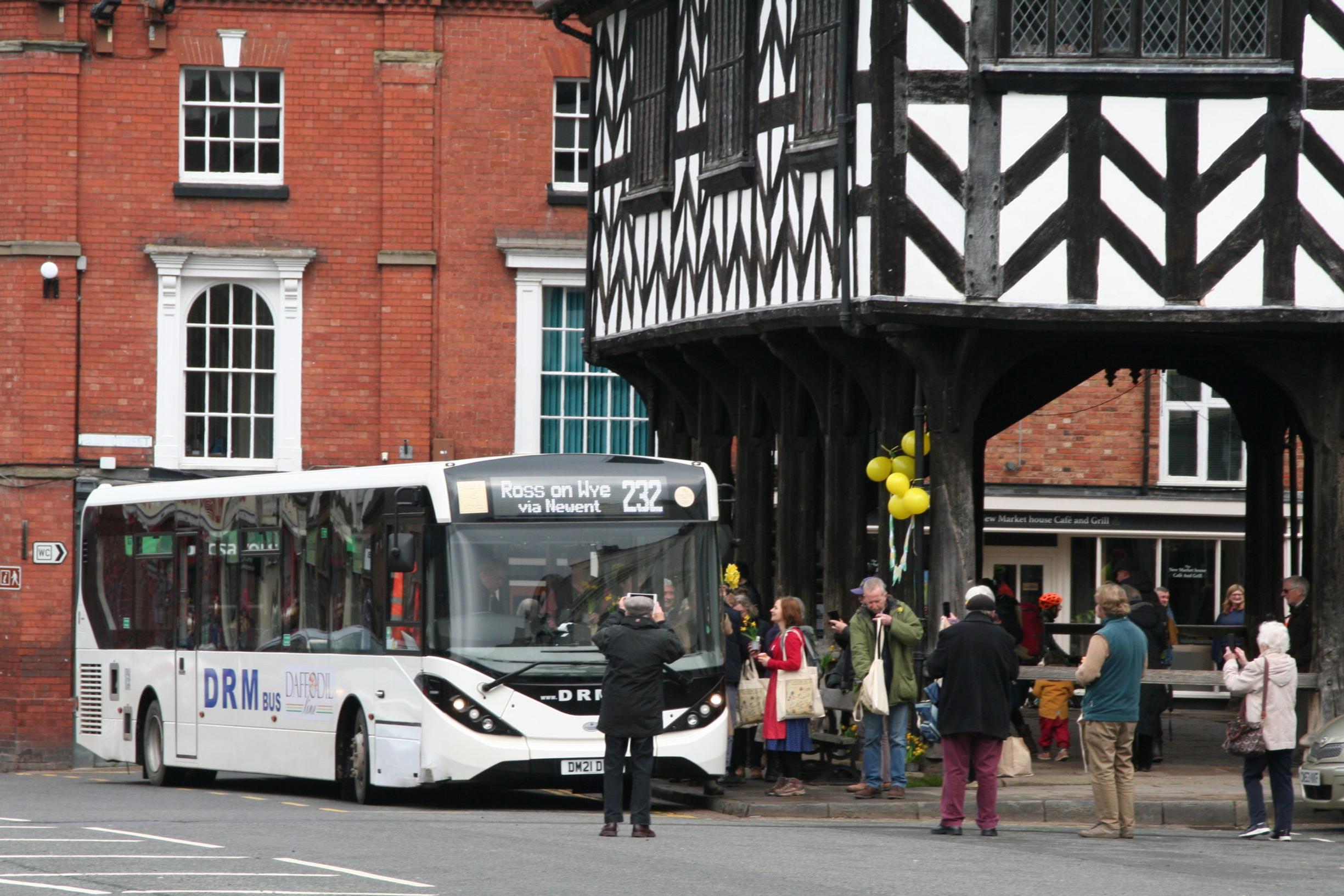Passengers boarding the 232 bus at Cantilupe Road, Ross-on-Wye