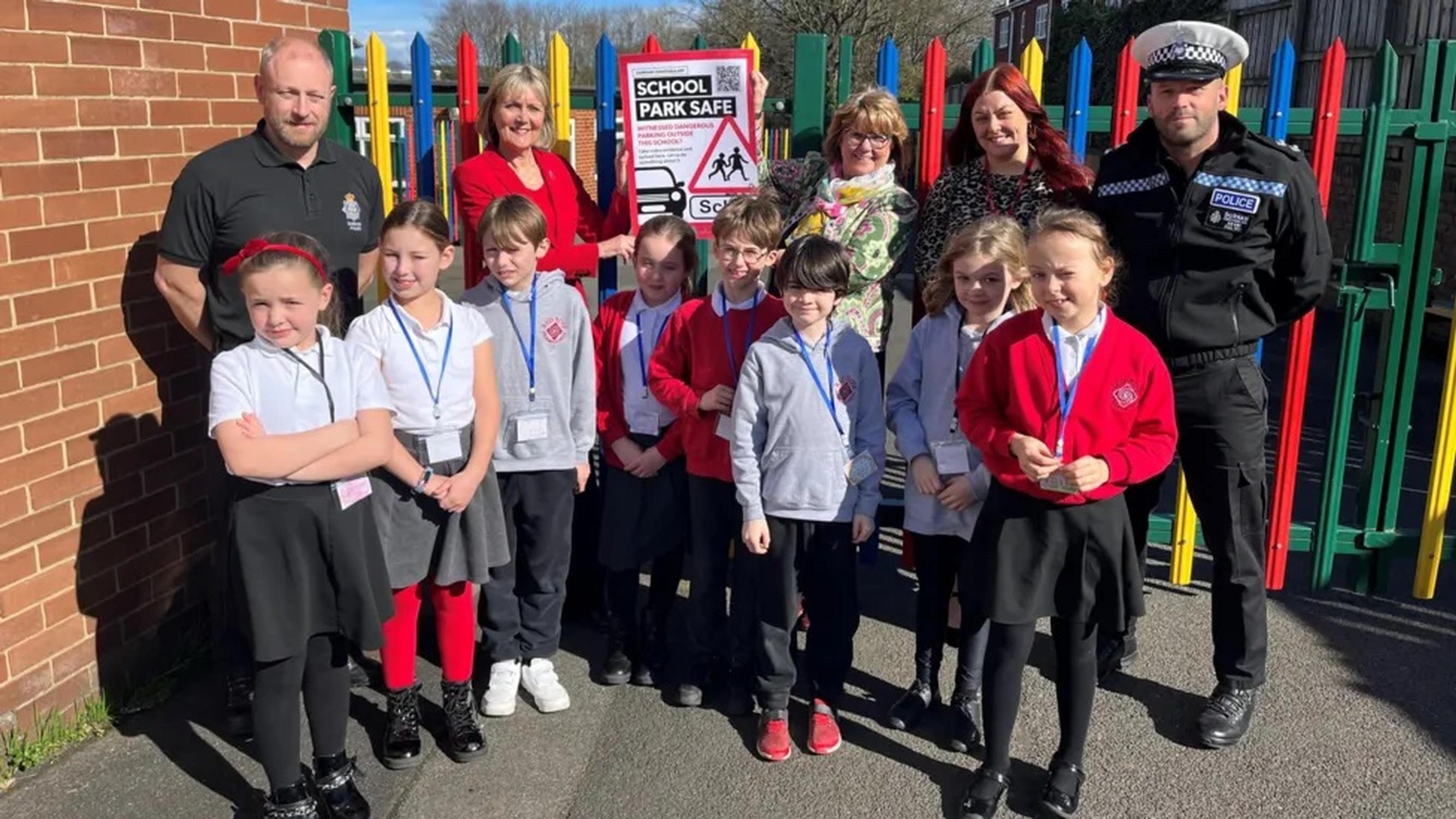 Children and staff from Chester-le-Street`s Red Rose Primary School with Durham Police officers