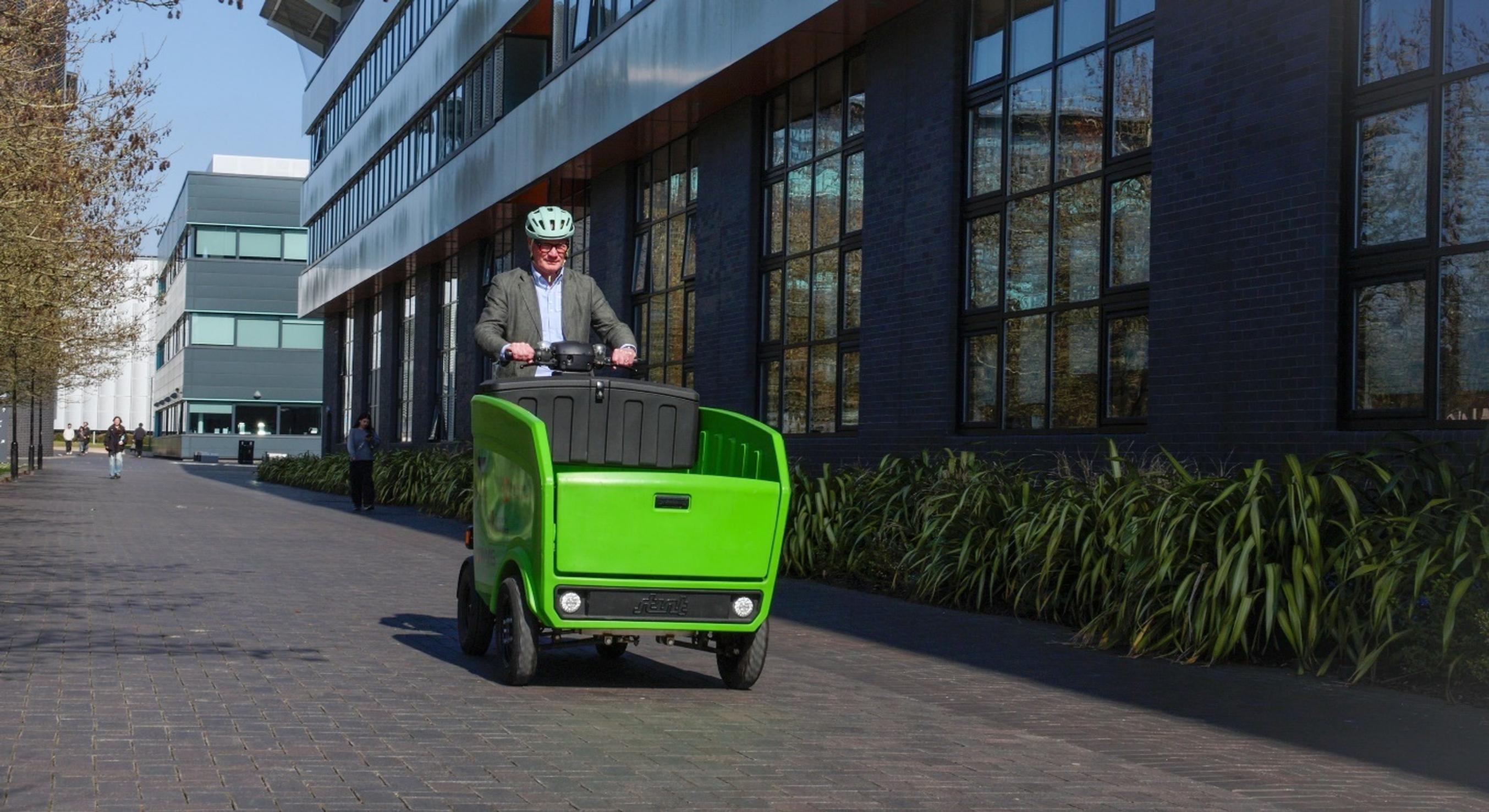 West Midlands Mayor Richard Parker tries out a Stuyf pickup, one of the low-speed electric vehicles being trialled at the University of Warwick campus