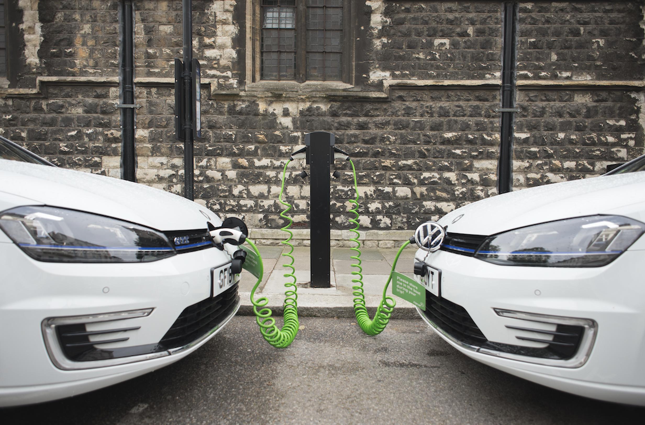 Zipcar EVs charging at the kerbside