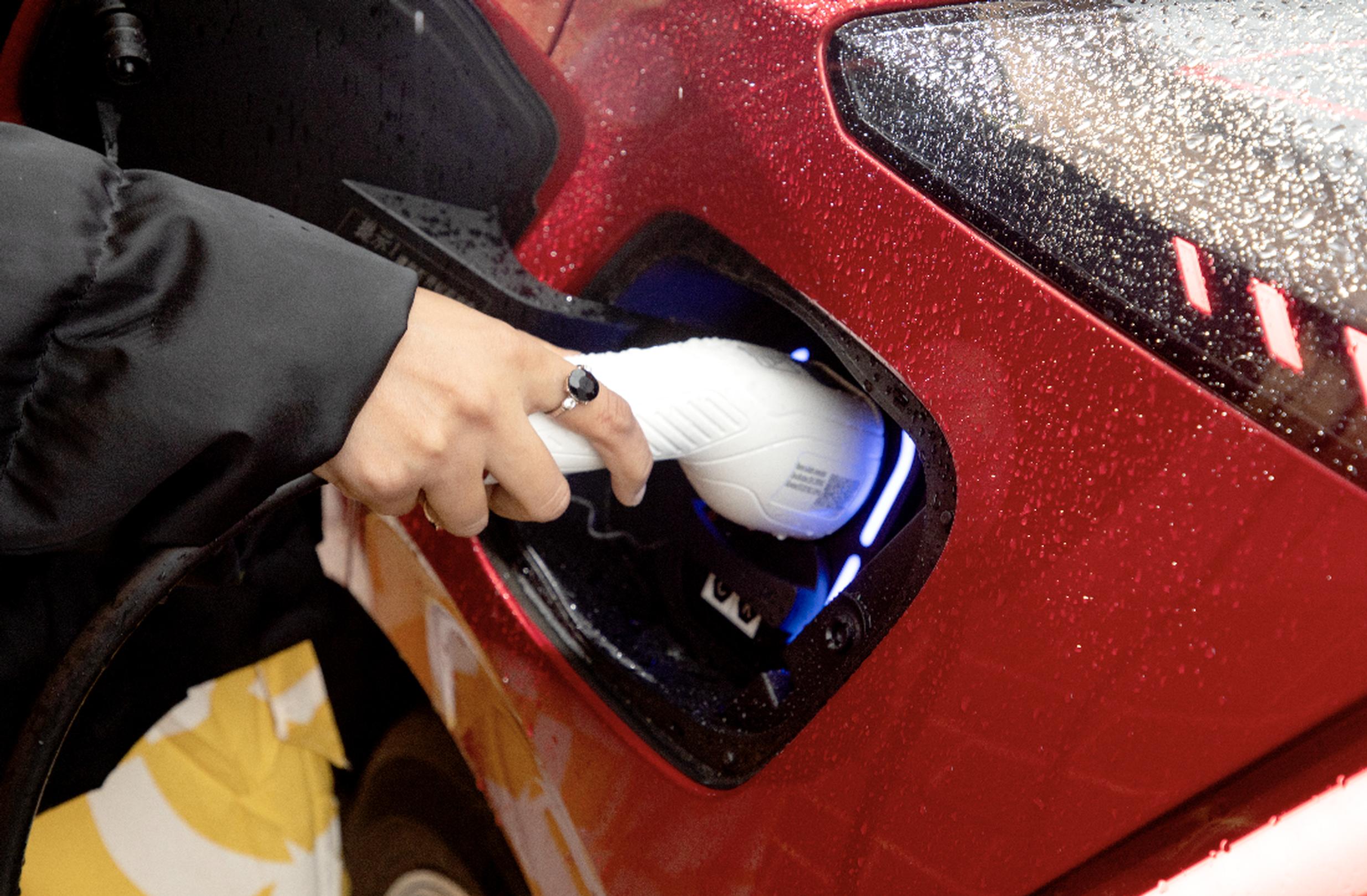 Inaccessible cross-pavement charging products and complex installation rules could stop people from switching to an electric vehicle