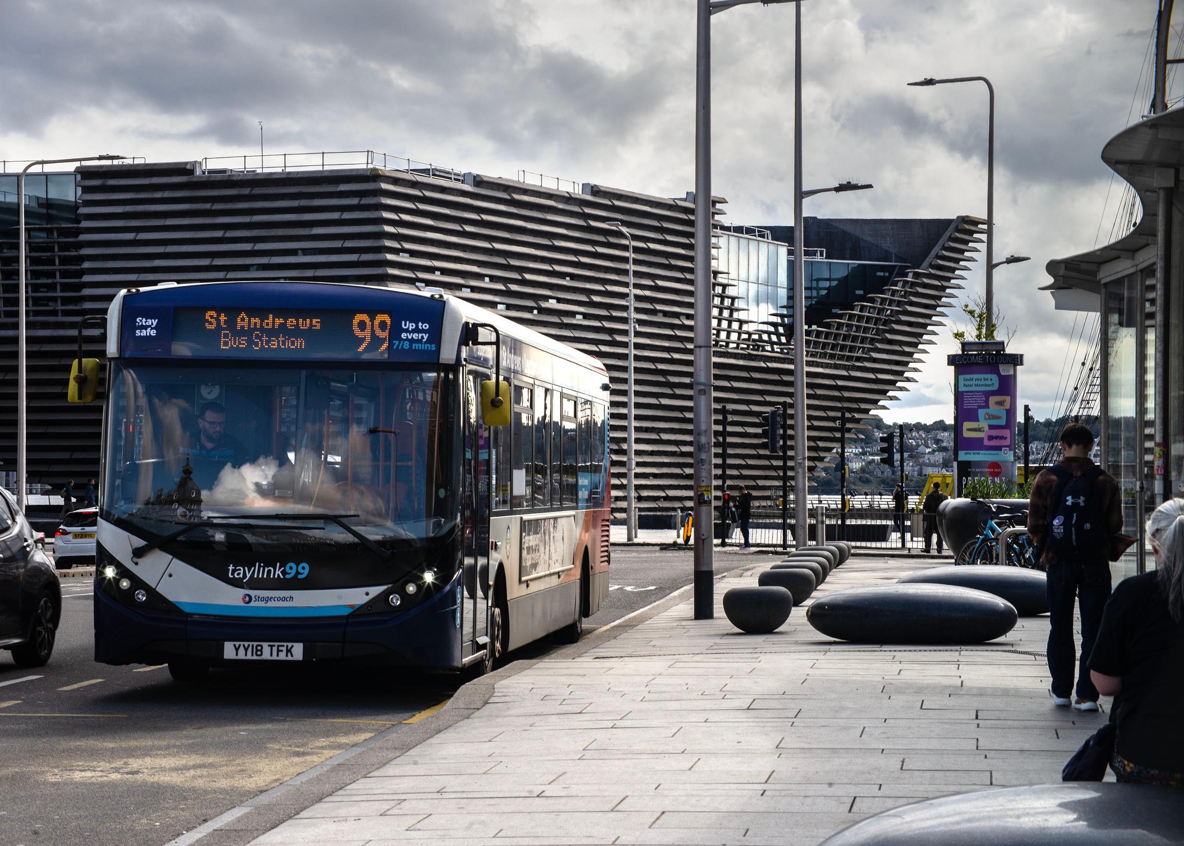 Bus and active travel outside the railway station in Dundee, which the CCC regards as a strong example of modal shift