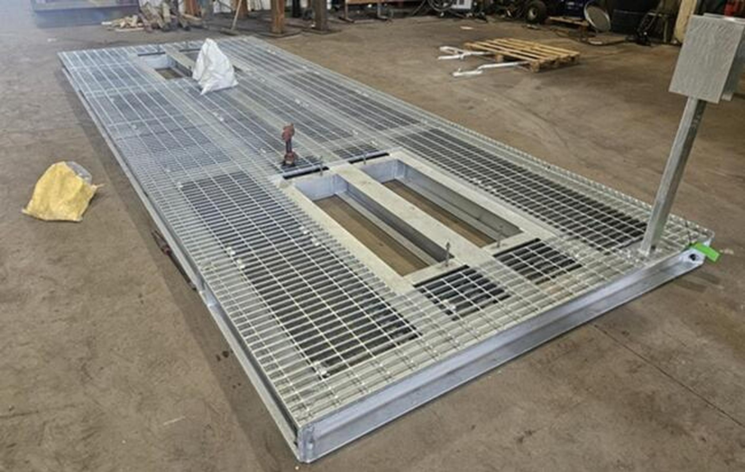 Steel grillage system to support weight of storage battery