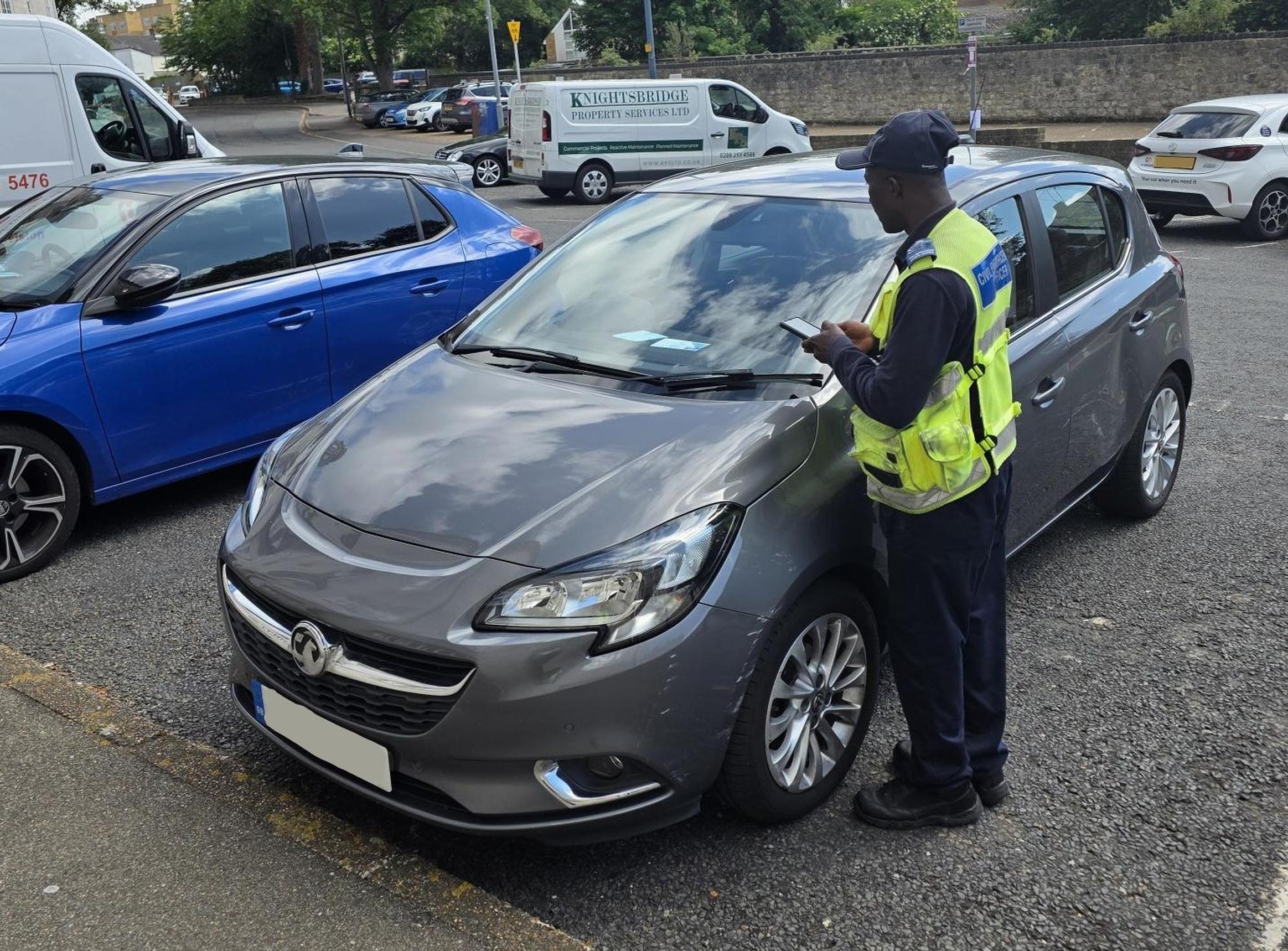 An APCOA CEO inspects a Blue Badge